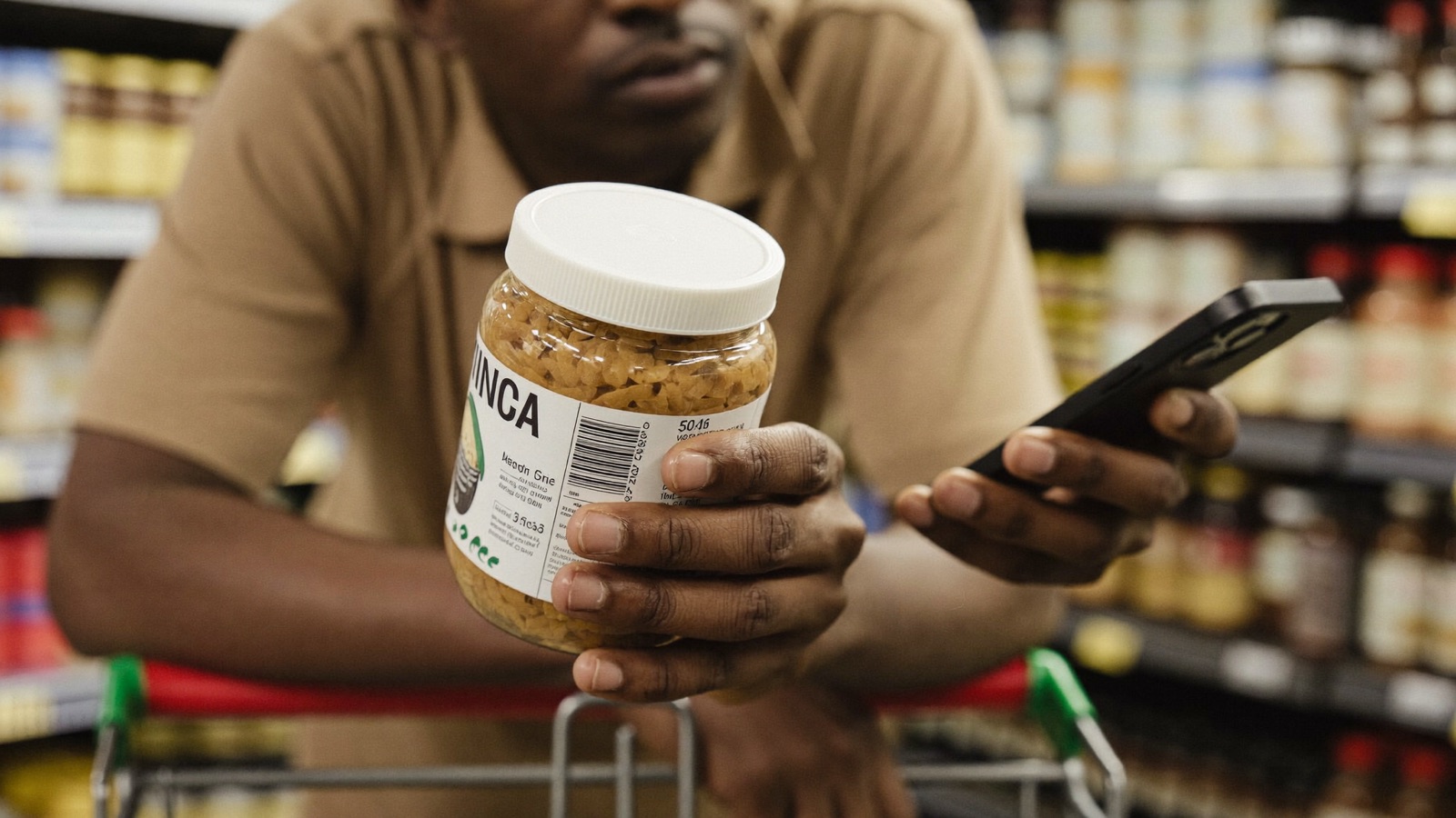 Shopper checking food additives on a sauce label with a scanner app nearby